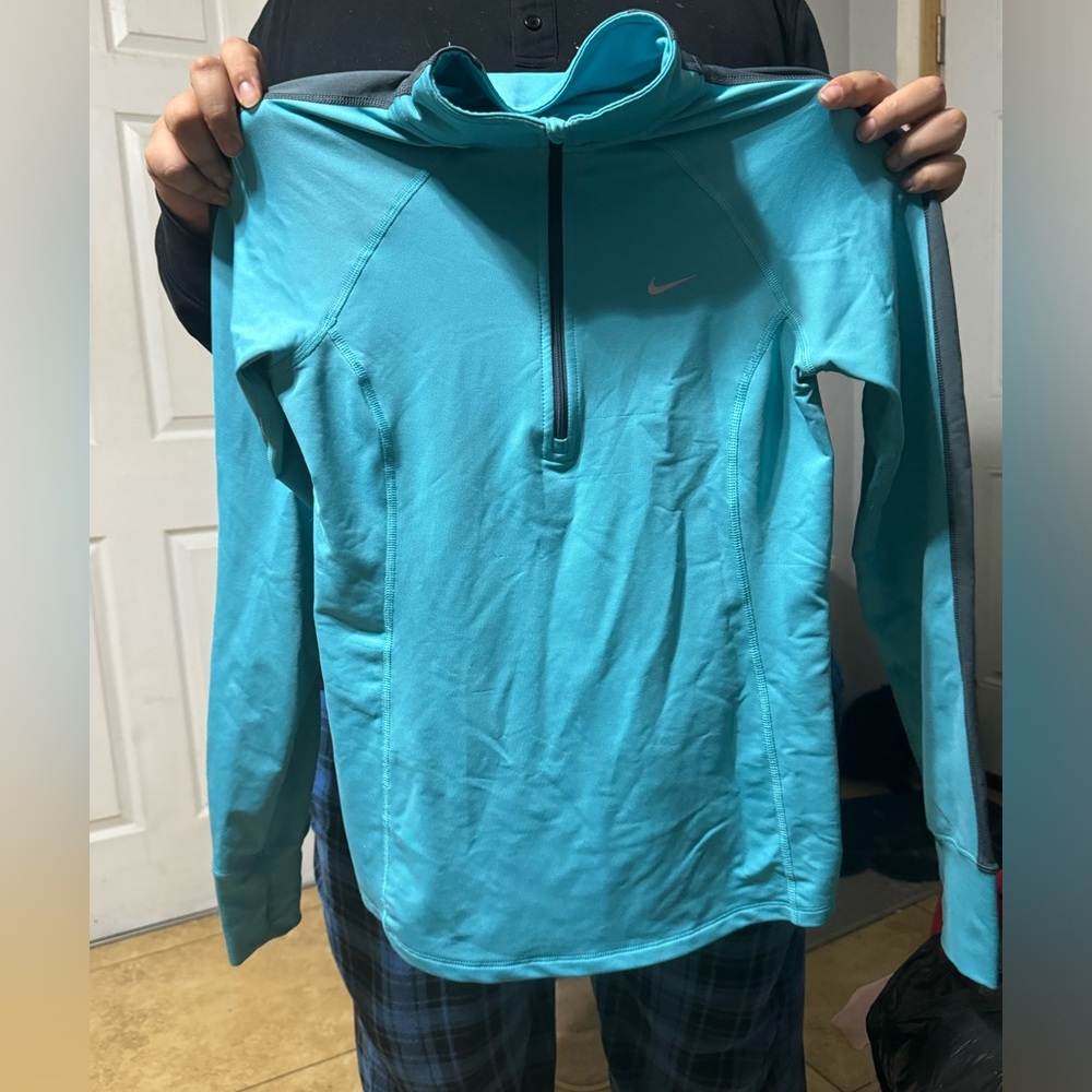 Light blue never user light sweater, probably for active going out!